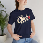 Wenatchee Chiefs Premium Lightweight T-Shirt in navy with the Wenatchee Chiefs logo, script lettering with an apple stitched like a baseball on the front, worn by model