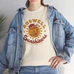 Roswell Sunshiners Heavyweight T-Shirt in natural with the Roswell Sunshiners logo, a smiling baseball sun in a red cap, with Sunshiners in red script on the front, worn by model