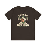 Tucson Cowboys Premium Lightweight T-Shirt in brown with the Tucson Cowboys logo, a cowboy in front of a saguaro with 1941 and 1953 pennant banners on the front