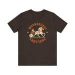 Woonsocket Trotters Premium Lightweight T-Shirt in brown with the Woonsocket Trotters logo, a harness racing driver in a baseball cap behind a trotting horse, the sulky wheel drawn as a baseball on the front