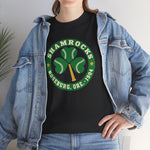 Roseburg Shamrocks Heavyweight T-Shirt in black with the Roseburg Shamrocks logo, a shamrock of baseballs with a bat stem in a green ring on the front, worn by model