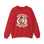 Spokane Smoke Eaters Crewneck Sweatshirt in red with the Spokane Smoke Eaters logo, a Dalmatian in a red fire helmet and bandana blowing smoke on the front