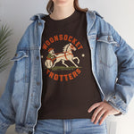 Woonsocket Trotters Heavyweight T-Shirt in dark chocolate with the Woonsocket Trotters logo, a harness racing driver in a baseball cap behind a trotting horse, the sulky wheel drawn as a baseball on the front, worn by model