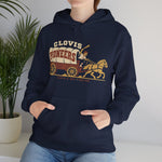Clovis Pioneers Hoodie in navy with the Clovis Pioneers logo, a ballplayer with a raised bat riding a horse-drawn covered wagon, with Pioneers on the canvas on the front, worn by model
