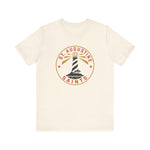 St. Augustine Saints Premium Lightweight T-Shirt in natural with the black and white striped lighthouse emblem with gold rays on the front