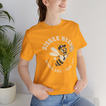 Bisbee Bees Premium Lightweight T-Shirt in gold with the Bisbee Bees logo, a cartoon bee in a ball cap catching a baseball on the front, worn by model