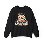 Seattle Clamdiggers Crewneck Sweatshirt in black with the Seattle Clamdiggers logo, a clam shell made from a baseball half-buried in a tide flat on the front