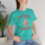 Key West Conchs Premium Lightweight T-Shirt in teal with the grinning striped conch shell mascot inside a teal diamond outline on the front, worn by model