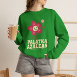 Palatka Azaleas Crewneck Sweatshirt in irish green with the smiling pink flower mascot with two baseballs above it on the front, worn by model