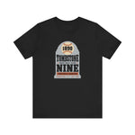 Tombstone Nine Premium Lightweight T-Shirt in black with the Tombstone Nine logo, a grey headstone topped by a baseball marked 1890, with Base Ball Club and a Territorial Champions banner on the front