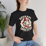 Spokane Smoke Eaters Premium Lightweight T-Shirt in black with the Spokane Smoke Eaters logo, a Dalmatian in a red fire helmet and bandana blowing smoke on the front, worn by model