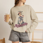 Tonopah Mollycoddles Crewneck Sweatshirt in sand with the Tonopah Mollycoddles logo, a monocled deadball-era dandy holding a teacup and leaning on his bat on the front, worn by model