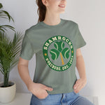 Roseburg Shamrocks Premium Lightweight T-Shirt in sage with the Roseburg Shamrocks logo, a shamrock of baseballs with a bat stem in a green ring on the front, worn by model