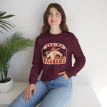 Yakima Packers Crewneck Sweatshirt in maroon with the Yakima Packers logo, a ballplayer holding a bat and a crate of apples on the front, worn by model