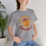 Roswell Sunshiners Premium Lightweight T-Shirt in athletic heather with the Roswell Sunshiners logo, a smiling baseball sun in a red cap, with Sunshiners in red script on the front, worn by model