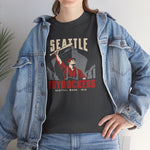 Seattle Drydockers Heavyweight T-Shirt in dark heather with the Seattle Drydockers logo, a shipyard worker raising a bat in front of a ship in drydock on the front, worn by model